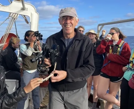 Captain Sean demonstrating how to use the sextant on the quarterdeck.