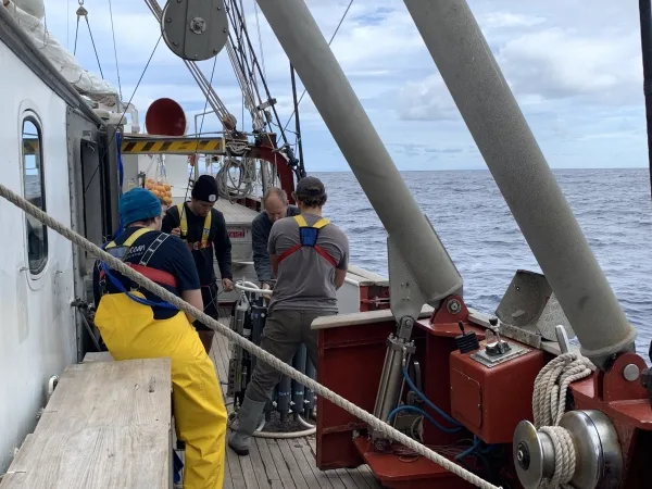 Team Science brings the sampling carousel back on board after a deployment.