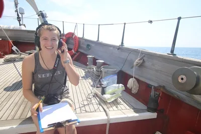 Kayla listening to the dolphins and whales on the Hydrophone.