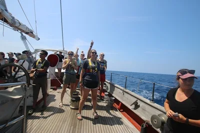 C-watch (from left to right: Kayla, Julia, Izzy, Emma and Alex) cheer their teammate on as they find a line.