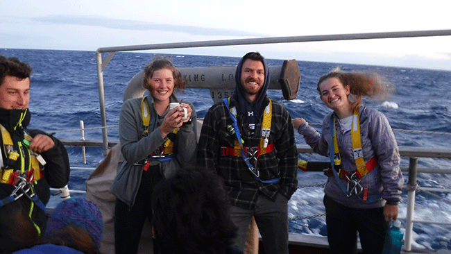 Students enjoying sunset time on the quarterdeck as rough weather broke on the way toward Wellington