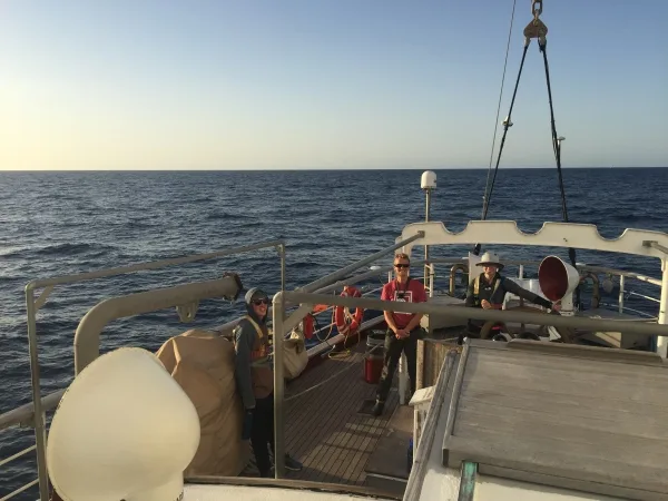 Intern Neil, 3rd mate Hila, and Nicole at the helm.