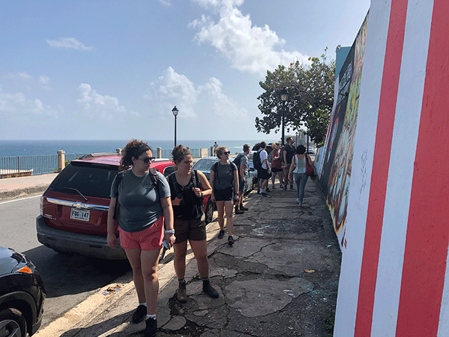 Students reflecting on street art in Old San Juan