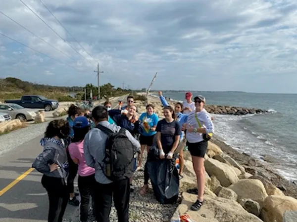 Students cleaning falmouth beach