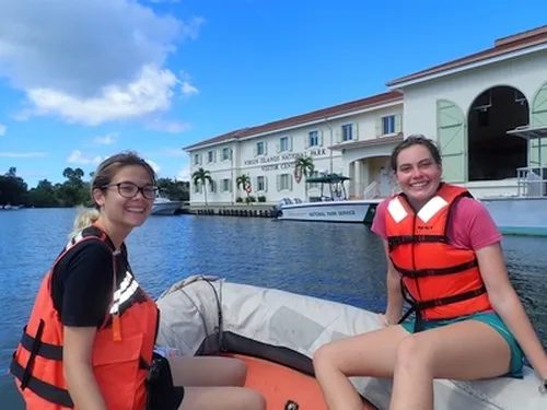 Camilla and Kayla on the rescue boat outside the visitor center.