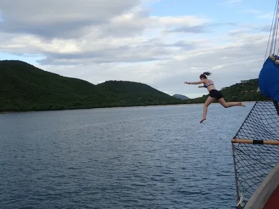 Steph leaping off the bowsprit on our swim call!