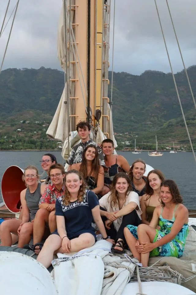 B Watch (Diego, Brighton, Bird, Aster, Nora, Micha, Maggie, Rikki, Paloma, Krista, and Matt) dressed up after our "black tie" dinner anchored off Nuku Hiva.