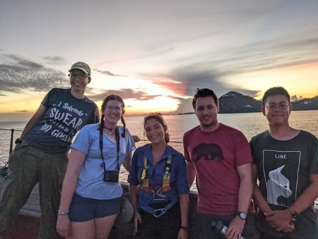 Eli, Hux, Maya, Nathan, and Pike enjoy the beautiful sunset while anchored in St. John.