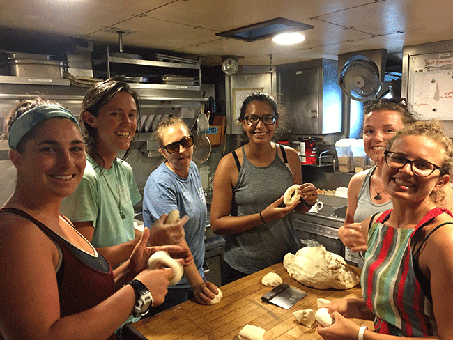 Science crew, Izzy and Cookie preparing bagels for final breakfast tomorrow.