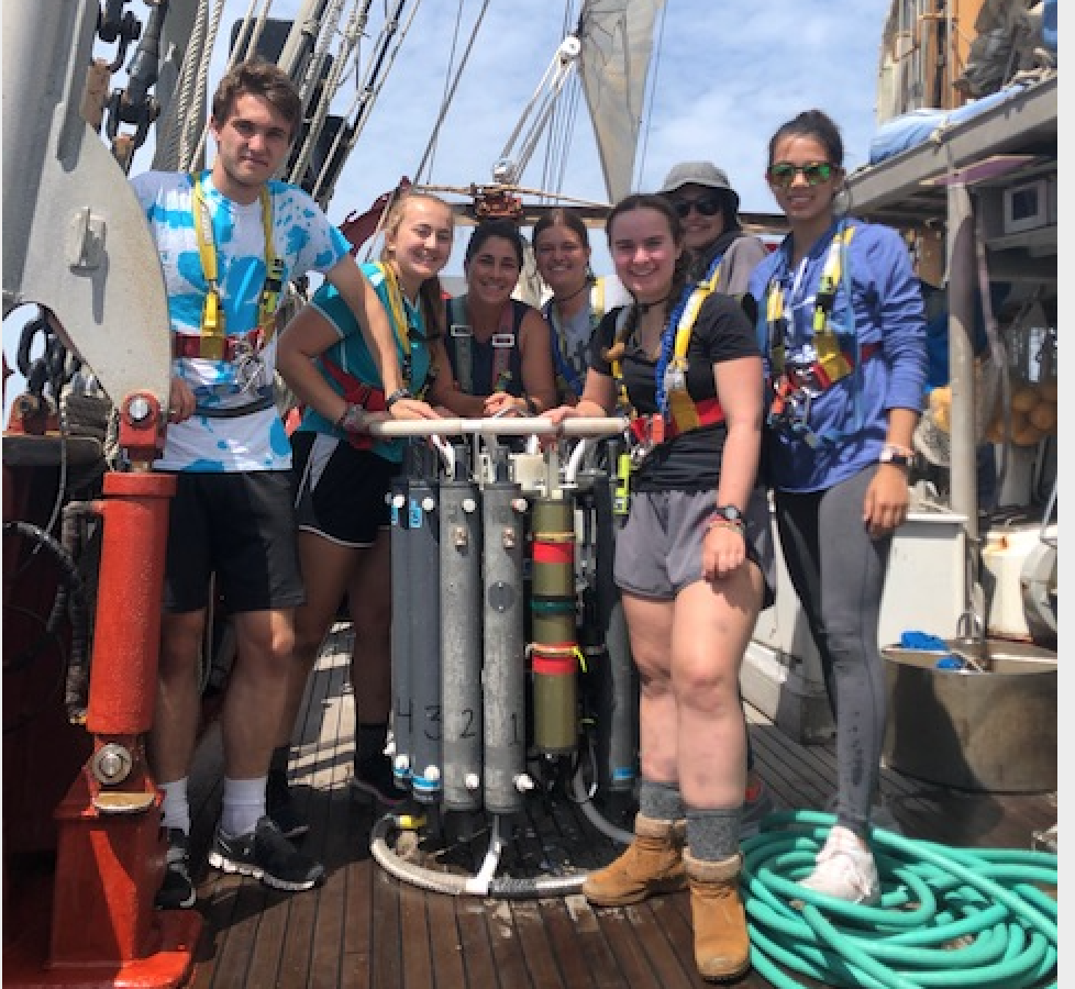 Students work with the carousel to gather oceanographic data in the Gulf of Maine.