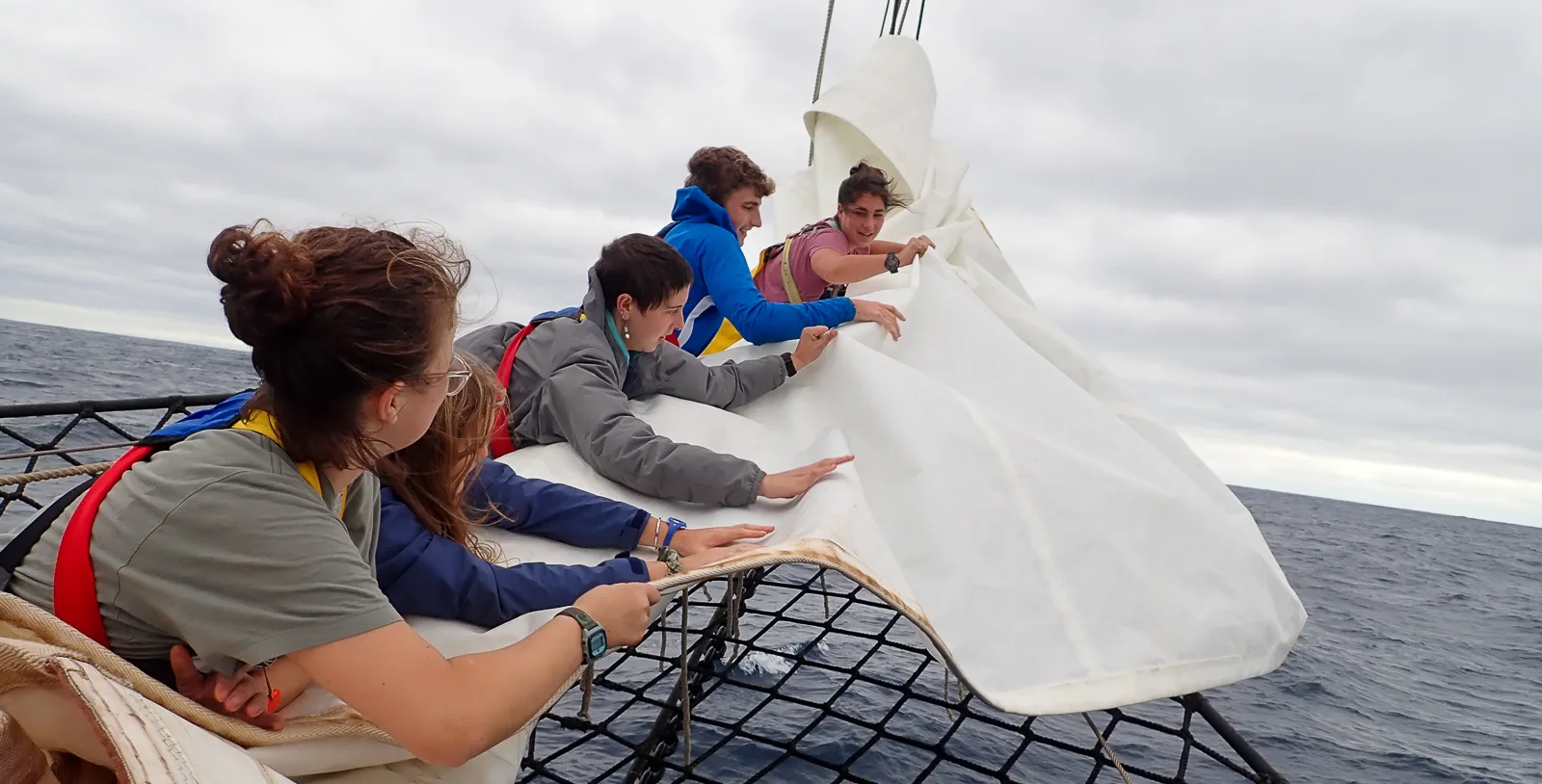 : Furling the jib is a many-hands job on the headrig